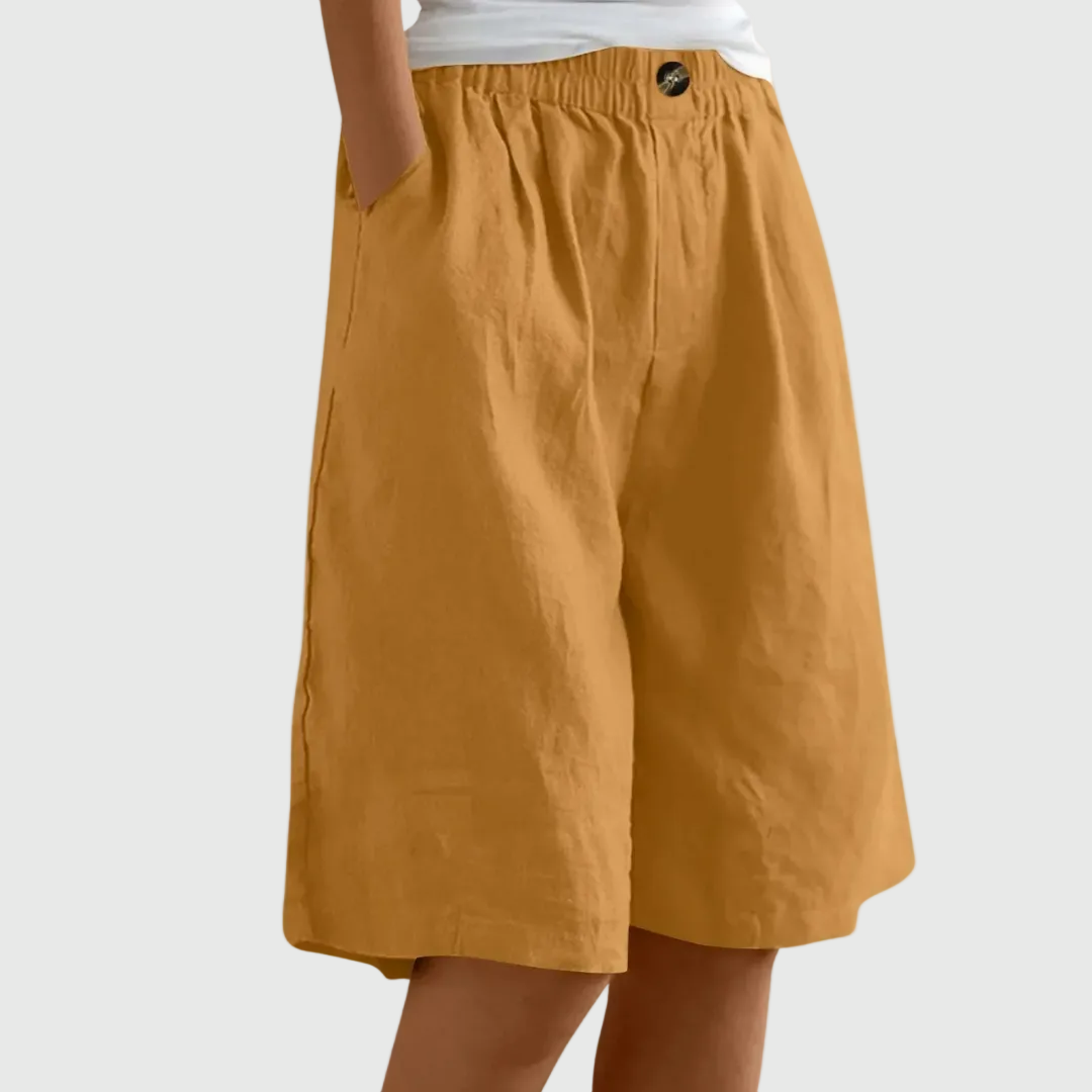Pantaloni corti larghi fino al ginocchio con cintura elastica e tasche