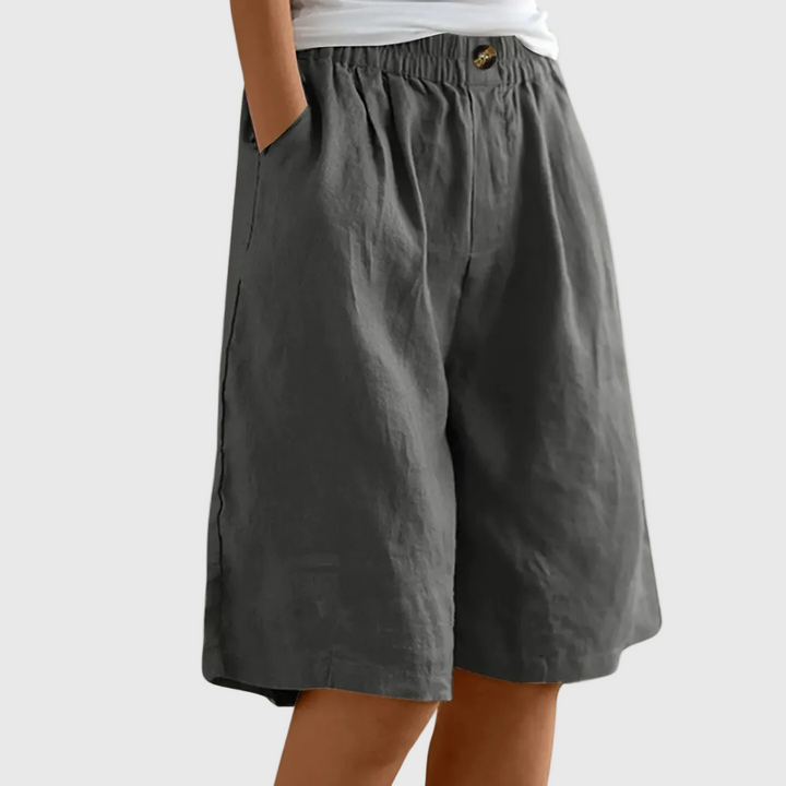 Pantaloni corti larghi fino al ginocchio con cintura elastica e tasche