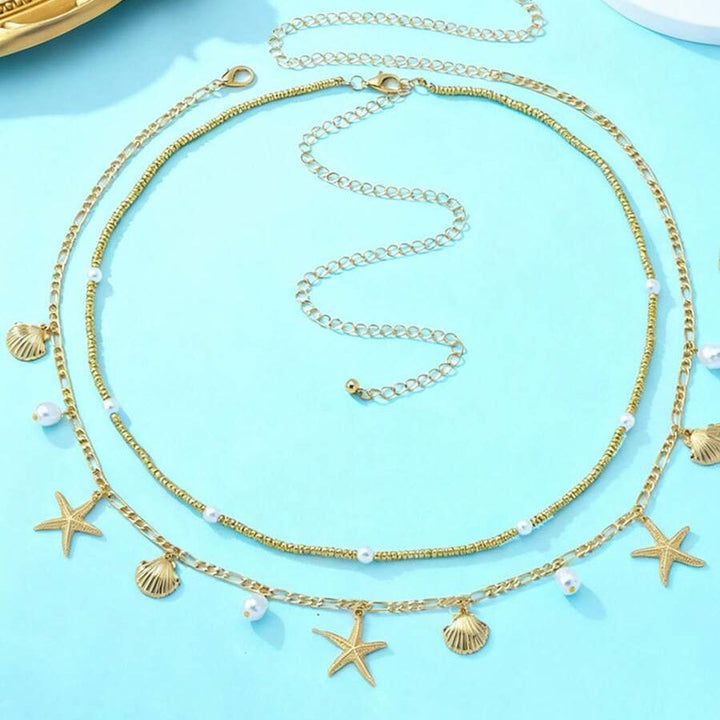 Set di cinture boho con conchiglie e stelle marine