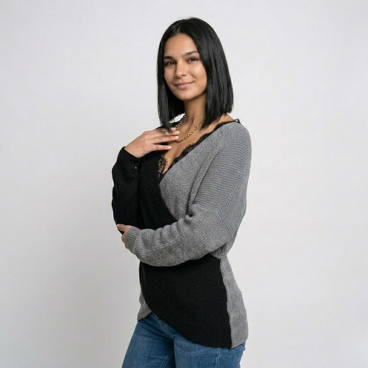 Maglione in misto poliestere ed elastan con taglio fluido e dettaglio in pizzo