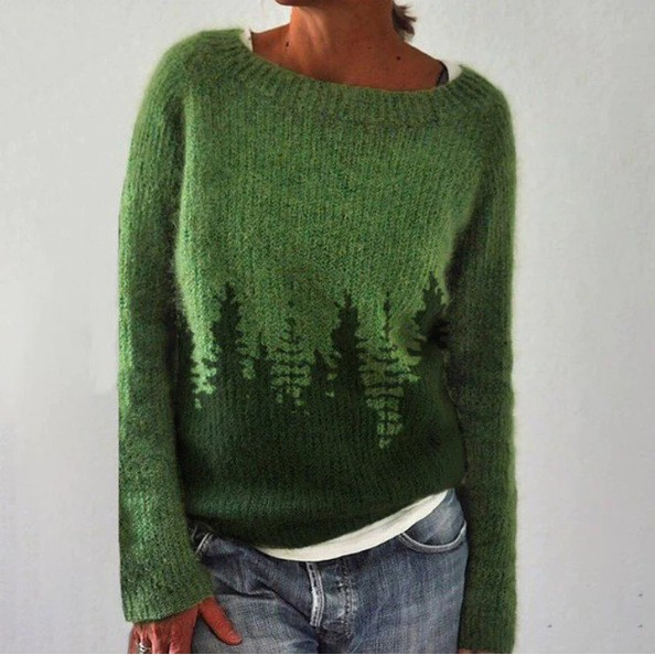 Maglione verde intrecciato con silhouette di foresta sull&