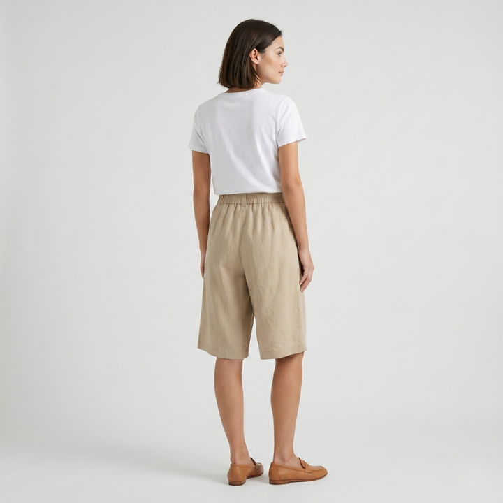 Pantaloni corti larghi fino al ginocchio con cintura elastica e tasche