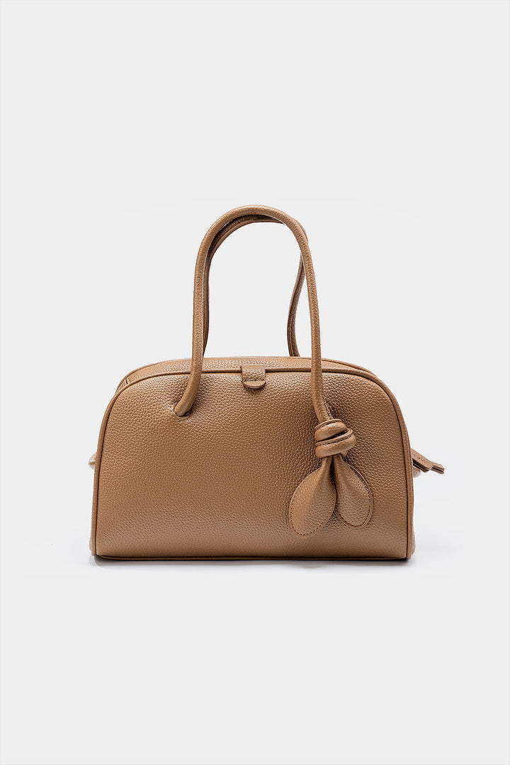 Borsa patchwork con un aspetto liscio