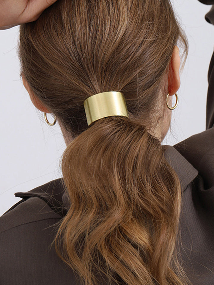 Accessorio lucido per capelli