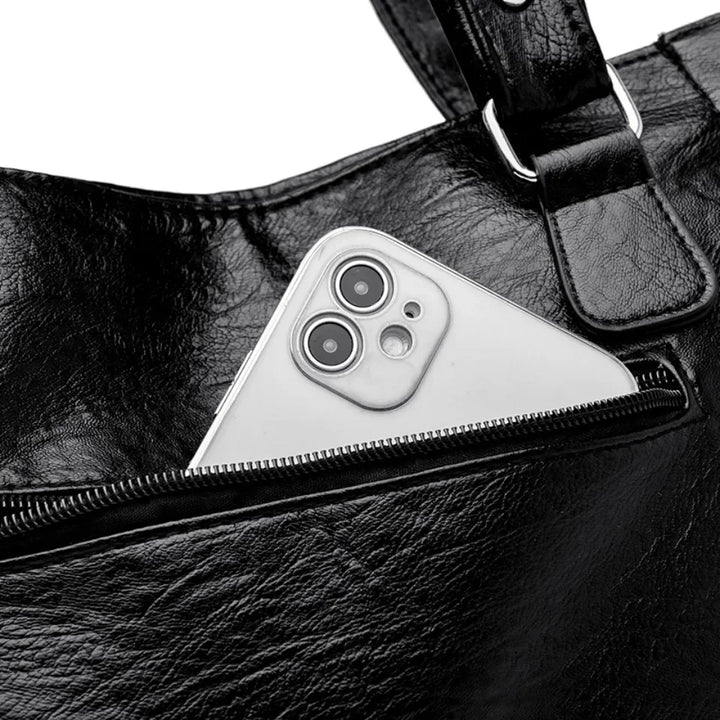 Borsa a tracolla liscia con forma spaziosa