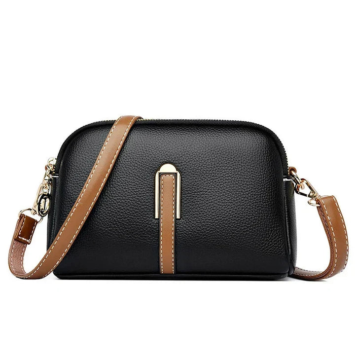 Questa borsa a tracolla compatta è ideale per le giornate piene di movimento
