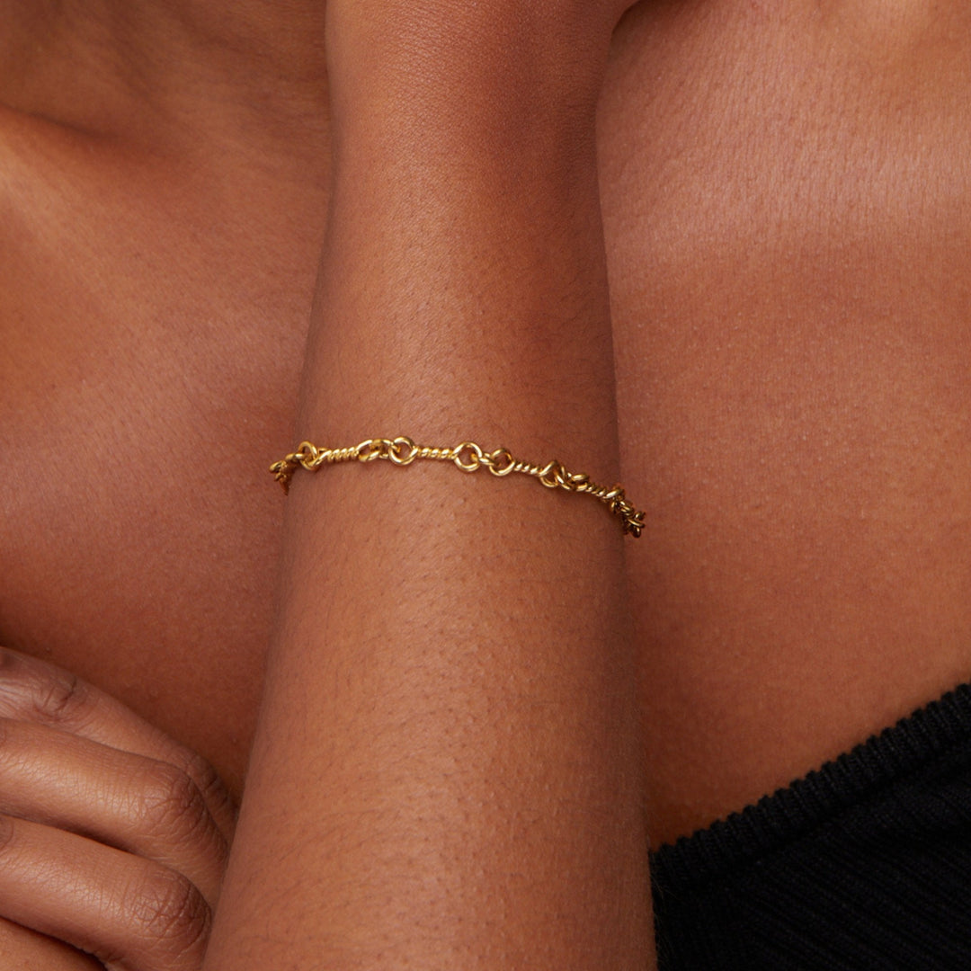 Bracciale Figaro in oro con nodo