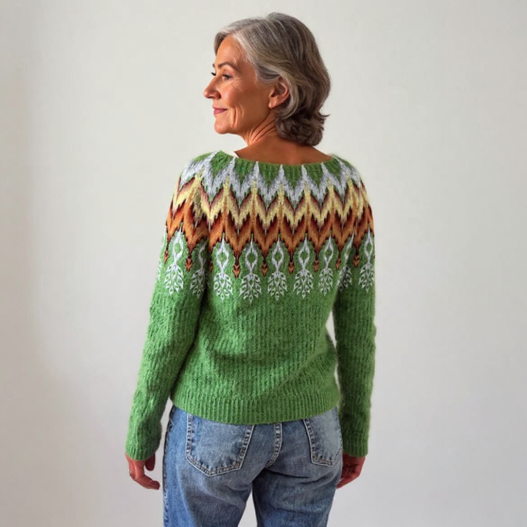 Maglione verde intrecciato con motivo a foglia sul colletto