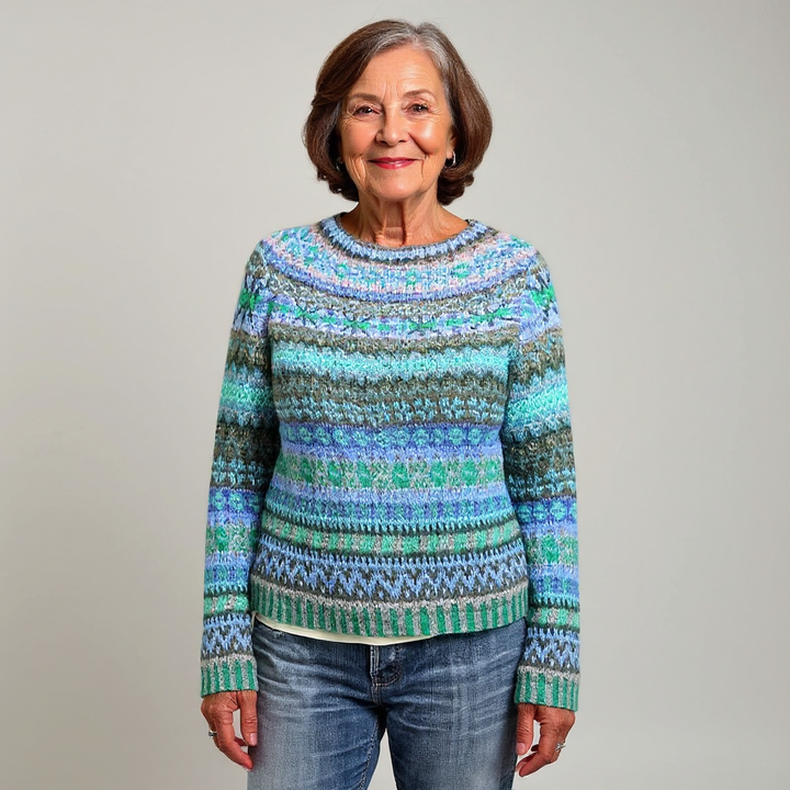 Maglione intrecciato in tonalità menta e blu con un motivo elaborato