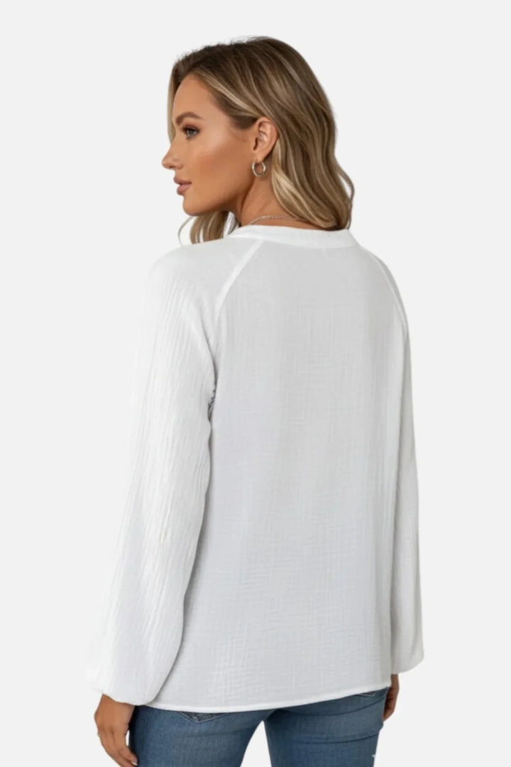 Jela | Blusa ricamata con scollatura a V