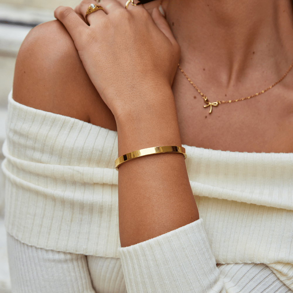 Bracciale rigido dorato Rina