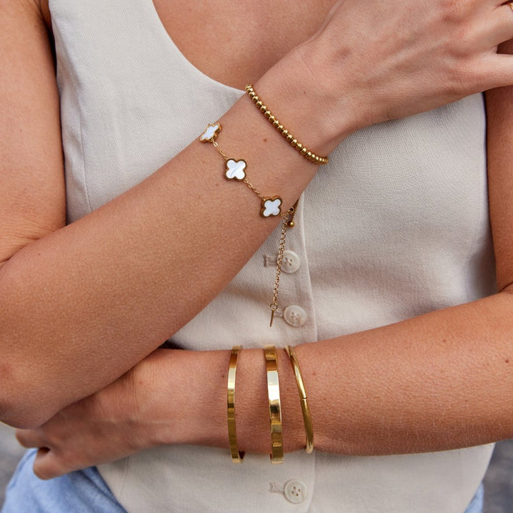 Bracciale rigido dorato Rina
