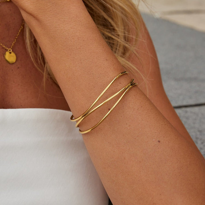 Bracciale rigido dorato a strati Sabrina