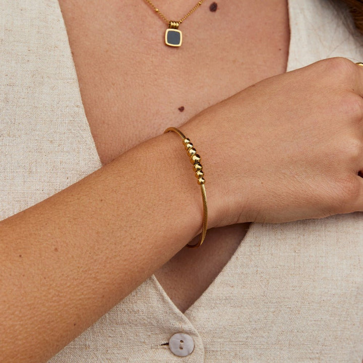 Bracciale decorativo rigido Yuri in oro